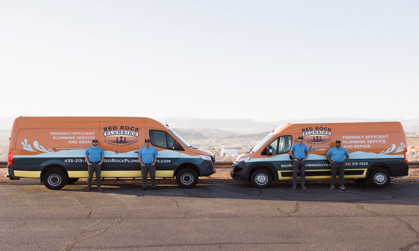 Red Rock Plumbing team with branded service vans in St. George, Utah